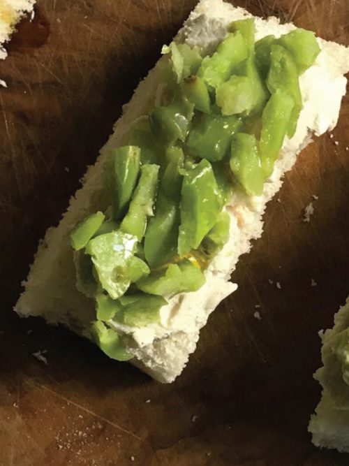 Broad beans and cream cheese on toast