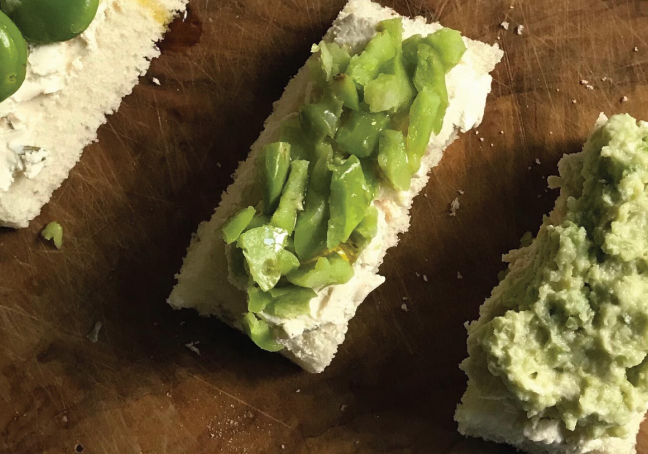 Broad beans and cream cheese on toast